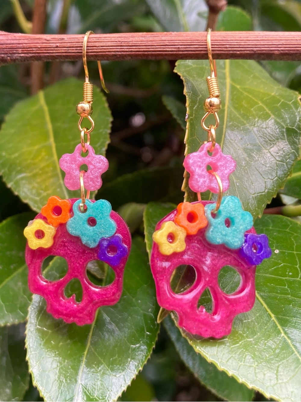 Floral skull earrings
